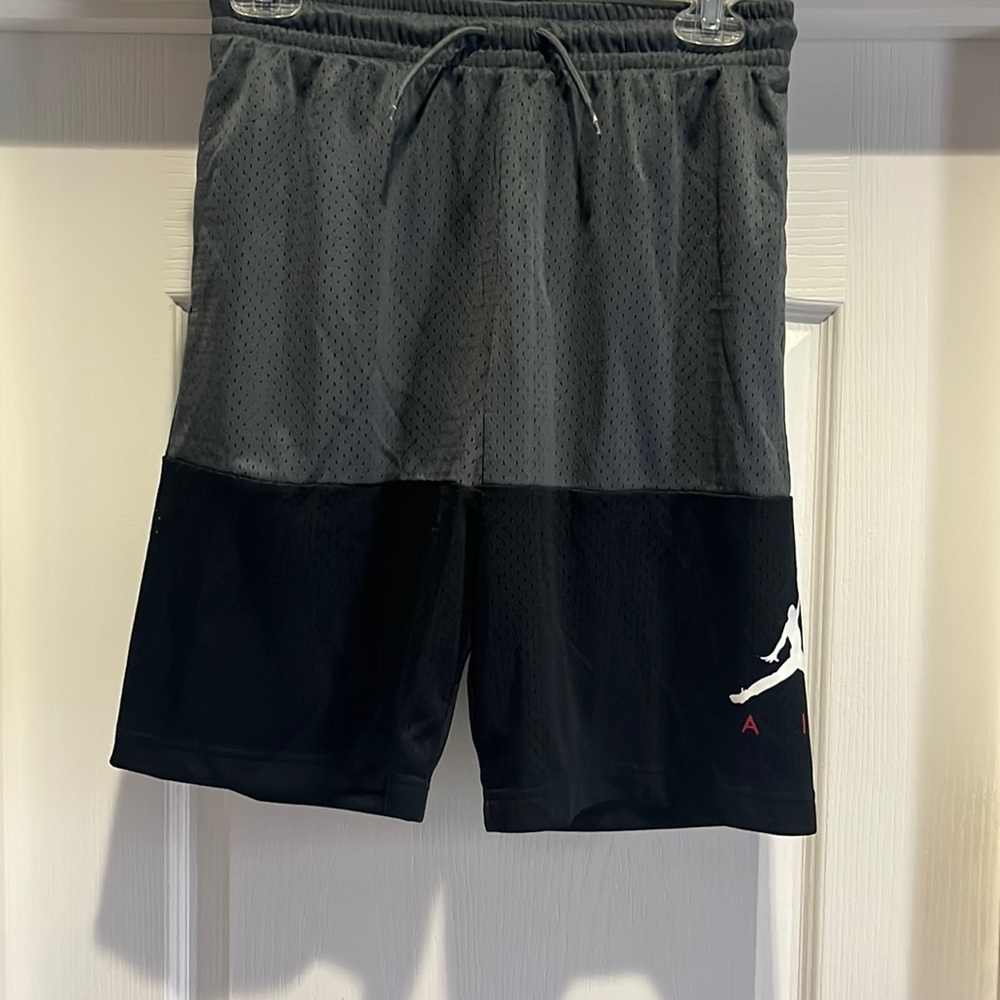 Black and gray Nike basketball shorts